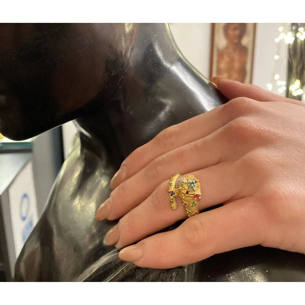 Gold ring with diamond and cornucopia stones