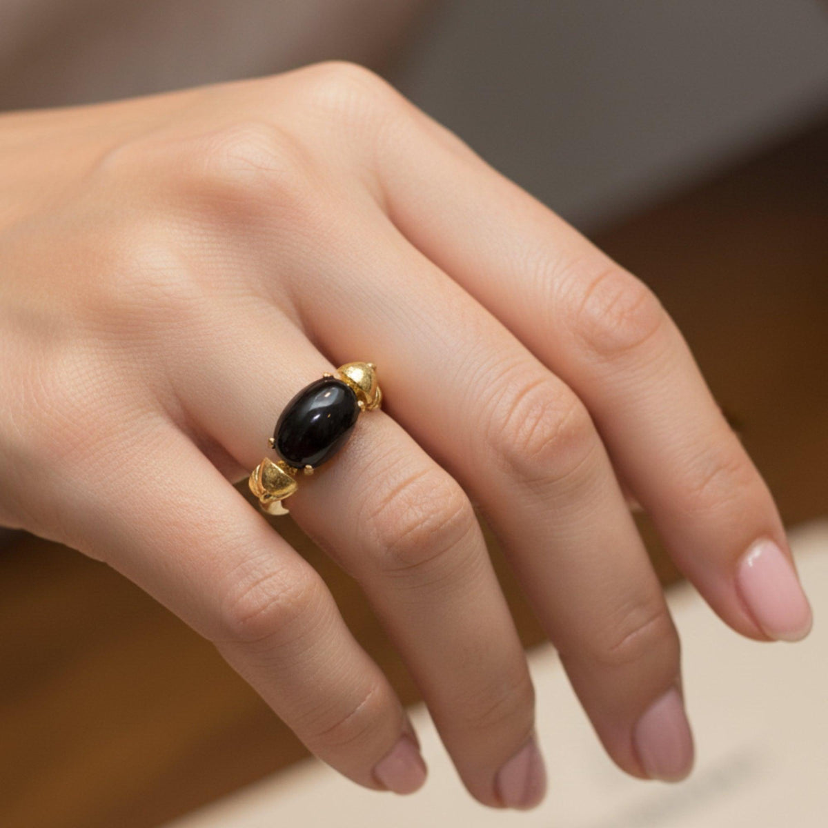 Gold-plated ring with natural stones from Pompeii worn