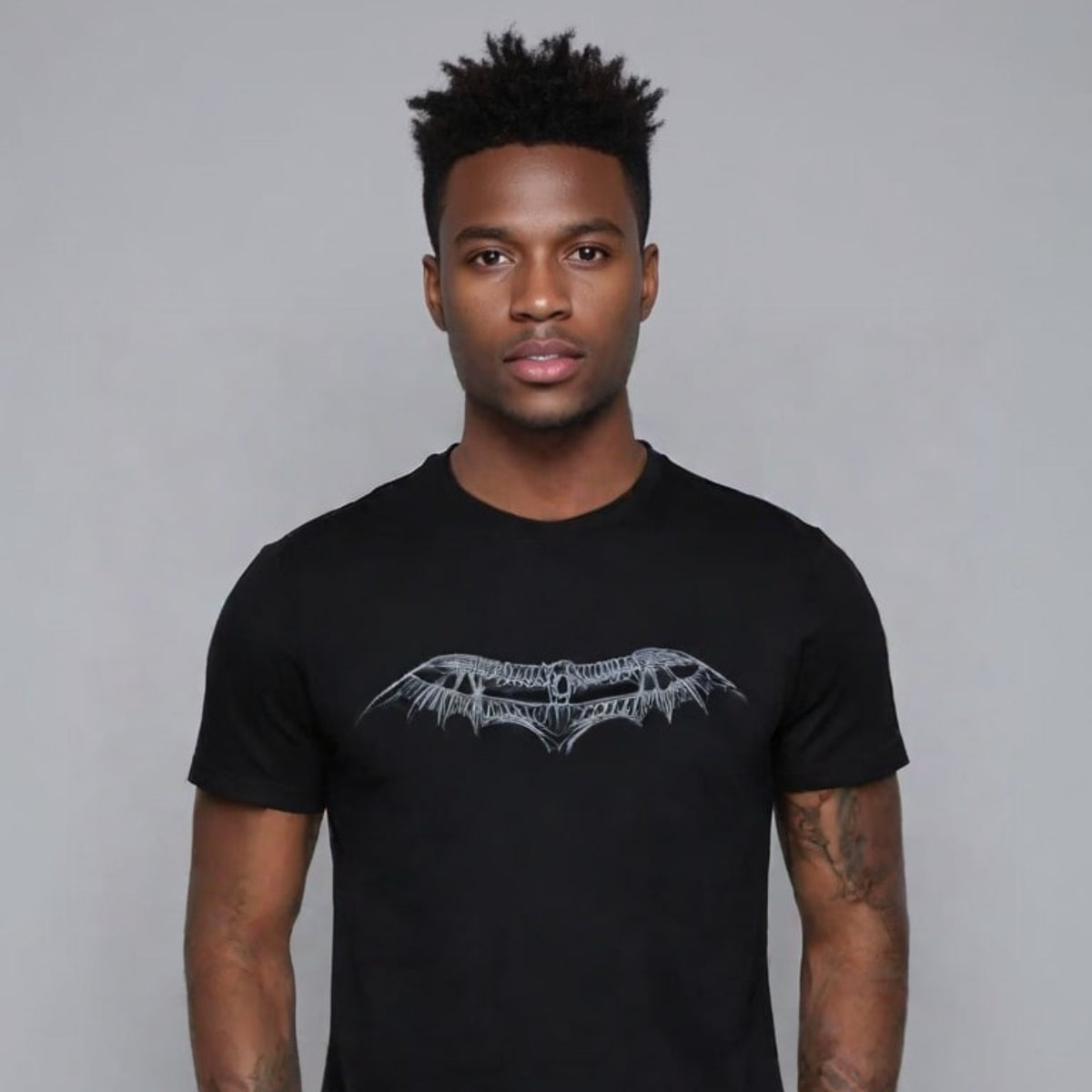 "T-shirt with Leonardo da Vinci's mechanical wing design"