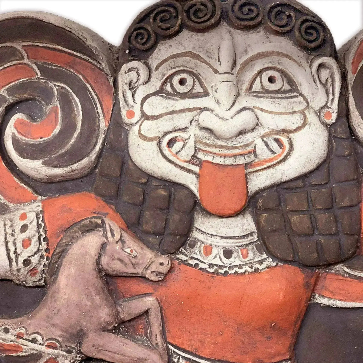 Terracotta plate depicting the running Gorgon Medusa, linked to Greek mythology and Syracuse