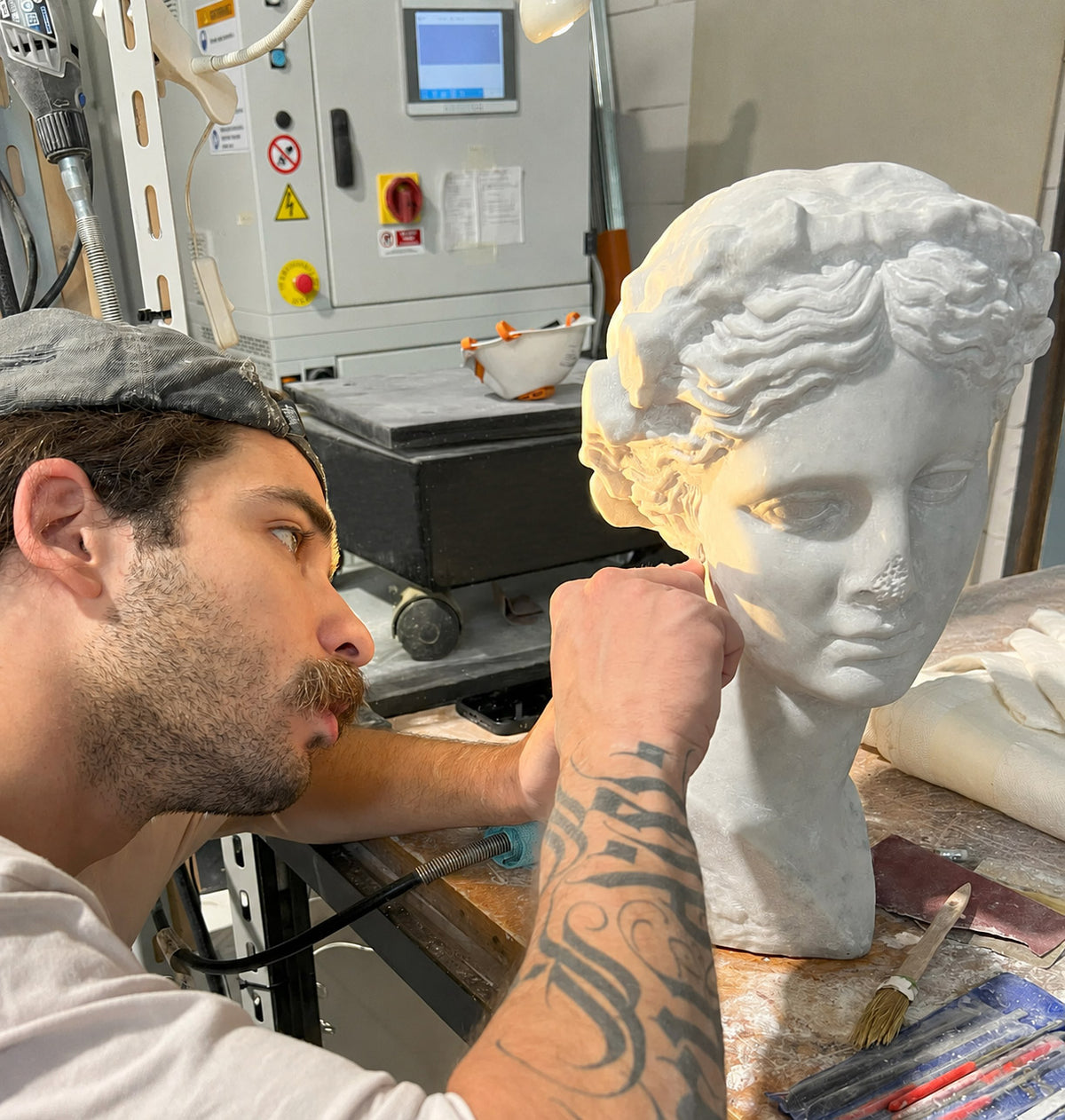 Sculpted and hand-finished in Italy.