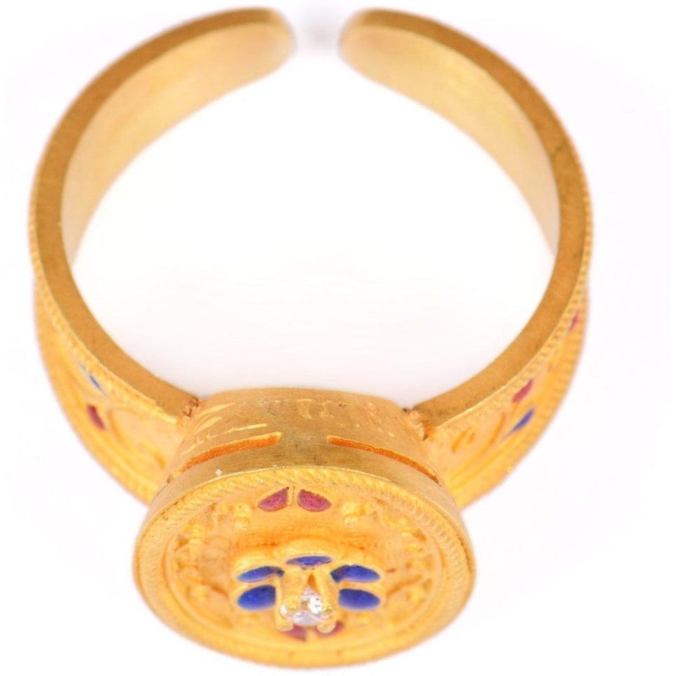 Anillo Cornucopia en oro de 18 quilates y piedras