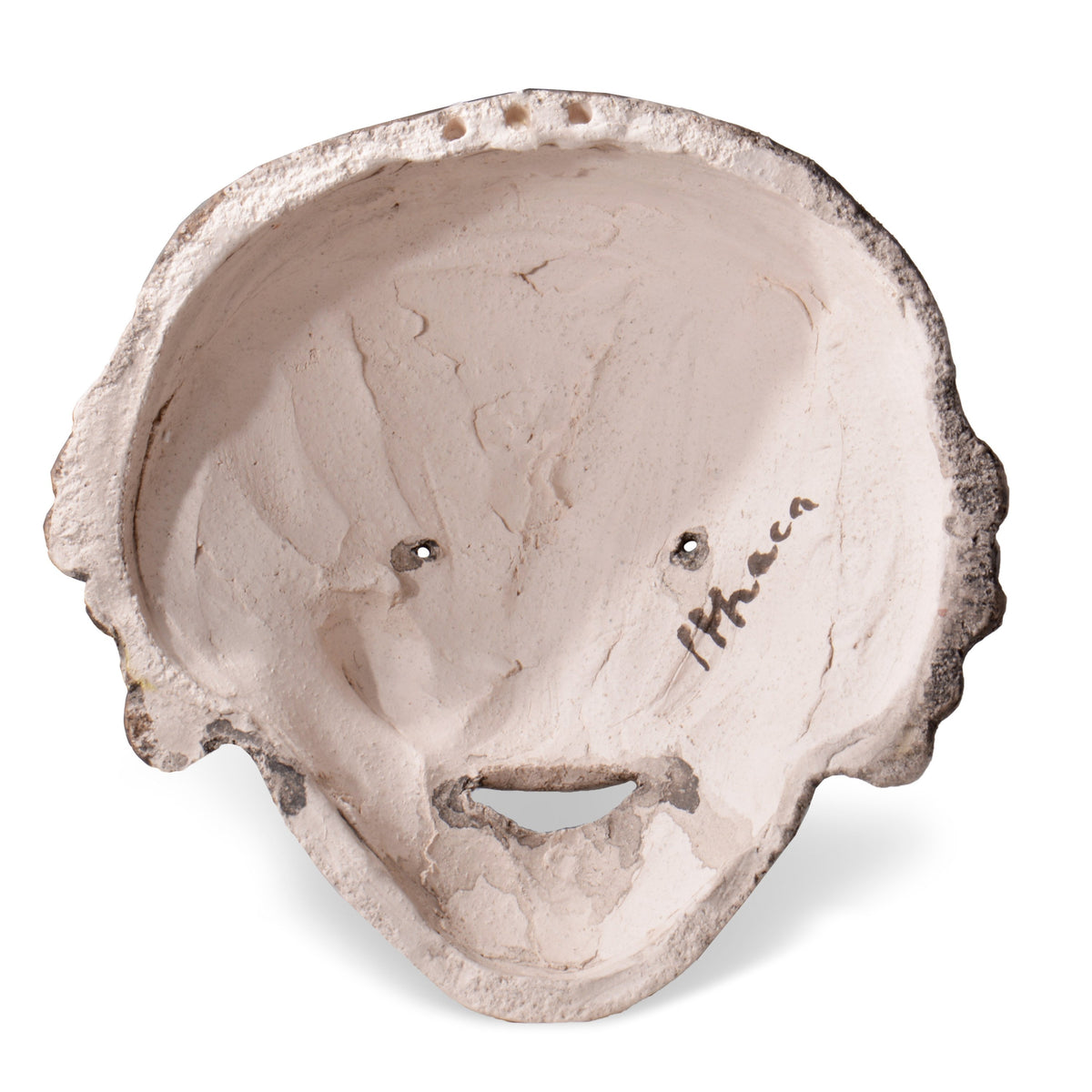 Retro concavo della maschera di Bacco in terracotta, con fori lungo il bordo superiore